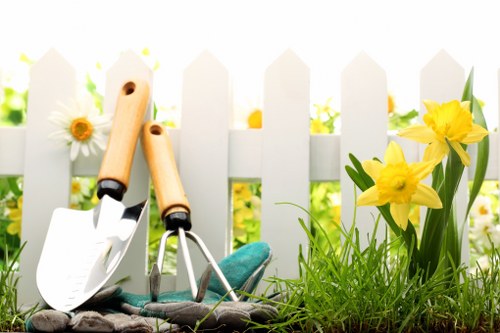 Gardener South Hornchurch using personal protective equipment during maintenance